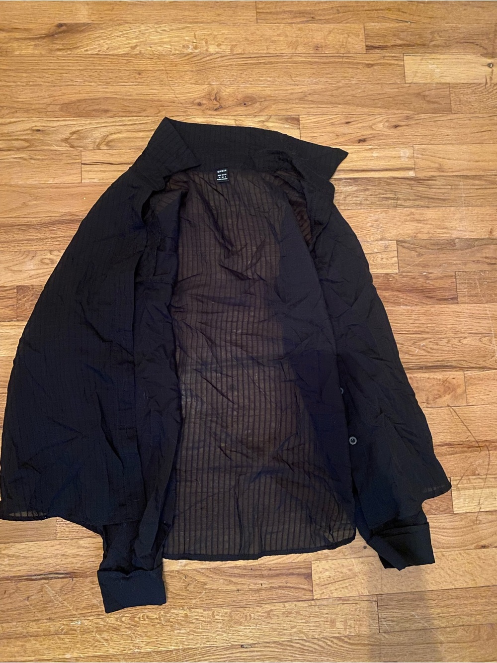 Woman’s see through button up flannel